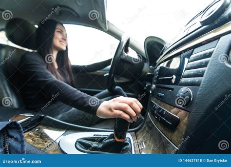 Crazy woman <strong>fucks</strong> stick-shift in her <strong>car</strong>. . Girl fucks with car gear liver
